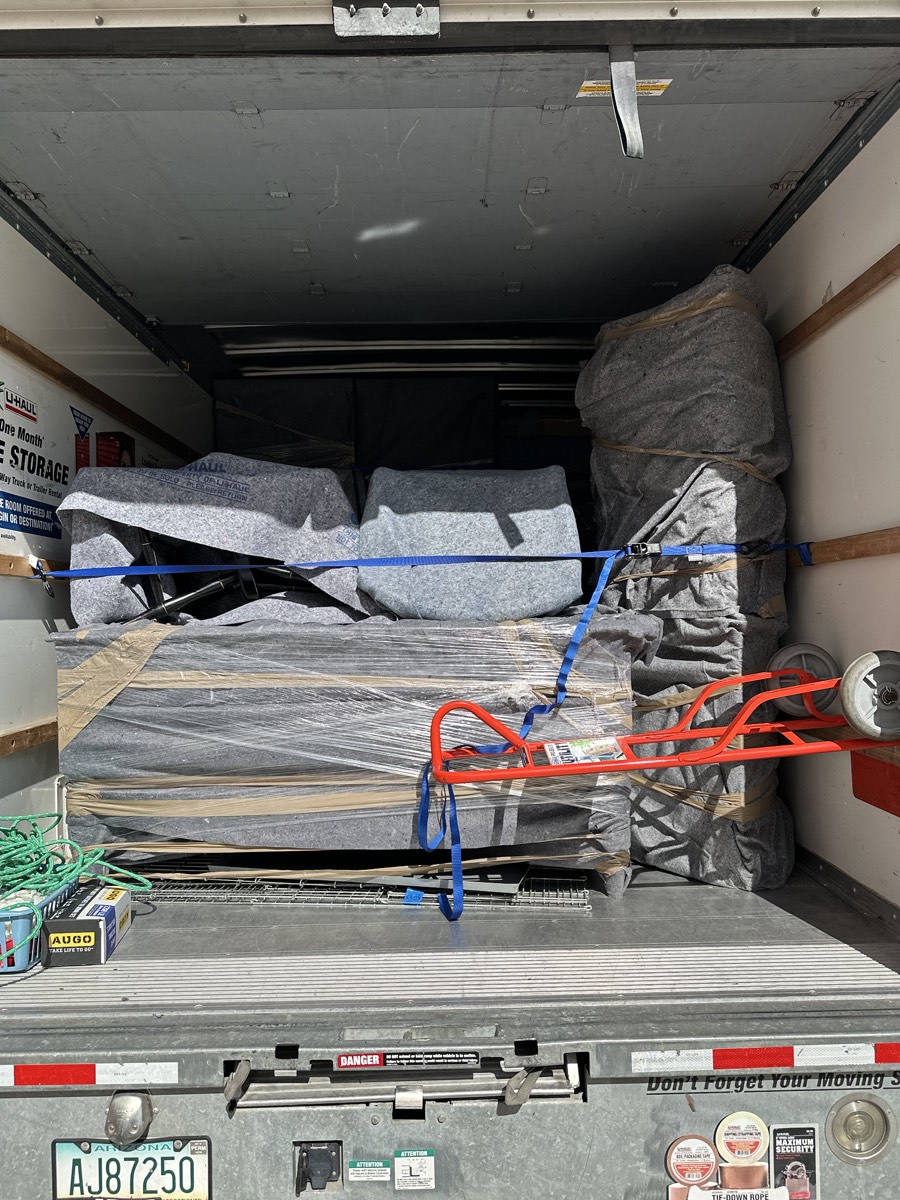 Furniture padded, wrapped and strapped securely in the truck